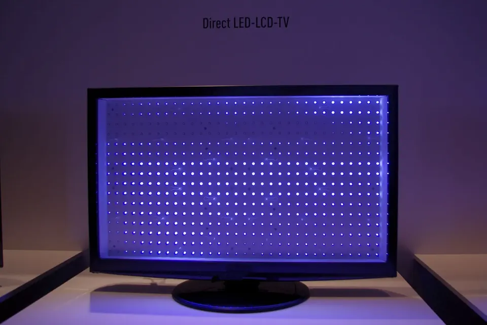 An LCD panel with its liquid-crystal layer removed, showing rows of lit backlight LEDs behind it