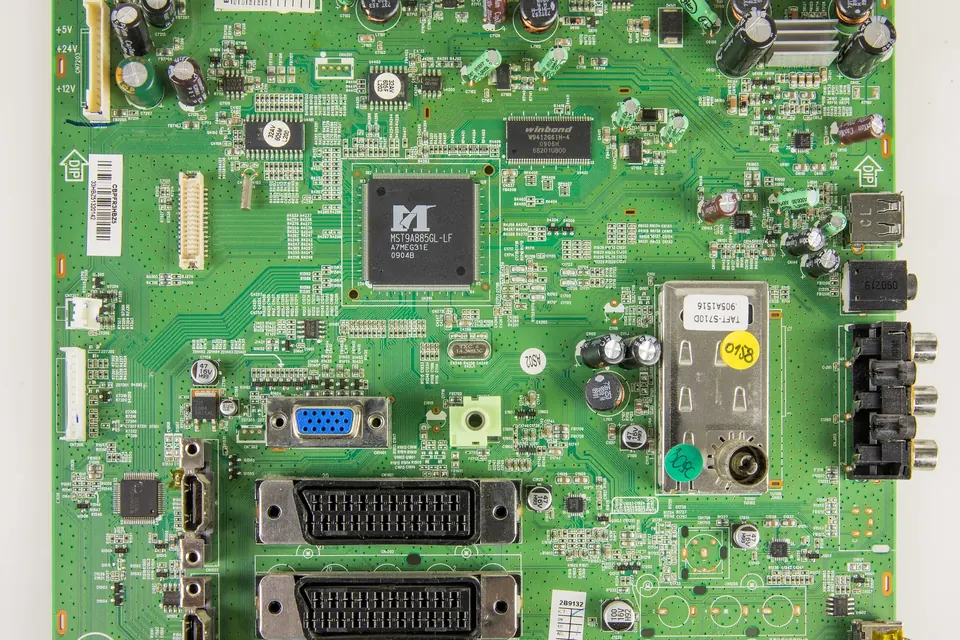 The main board of a 26-inch LCD TV, with the input connectors along one edge and the video processor in the centre